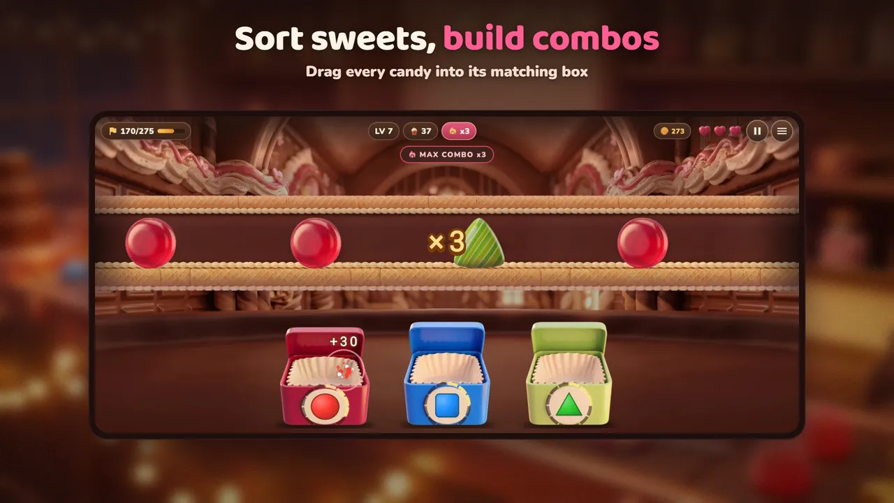 Candies moving along a belt above red, blue and green boxes, with a times-three combo