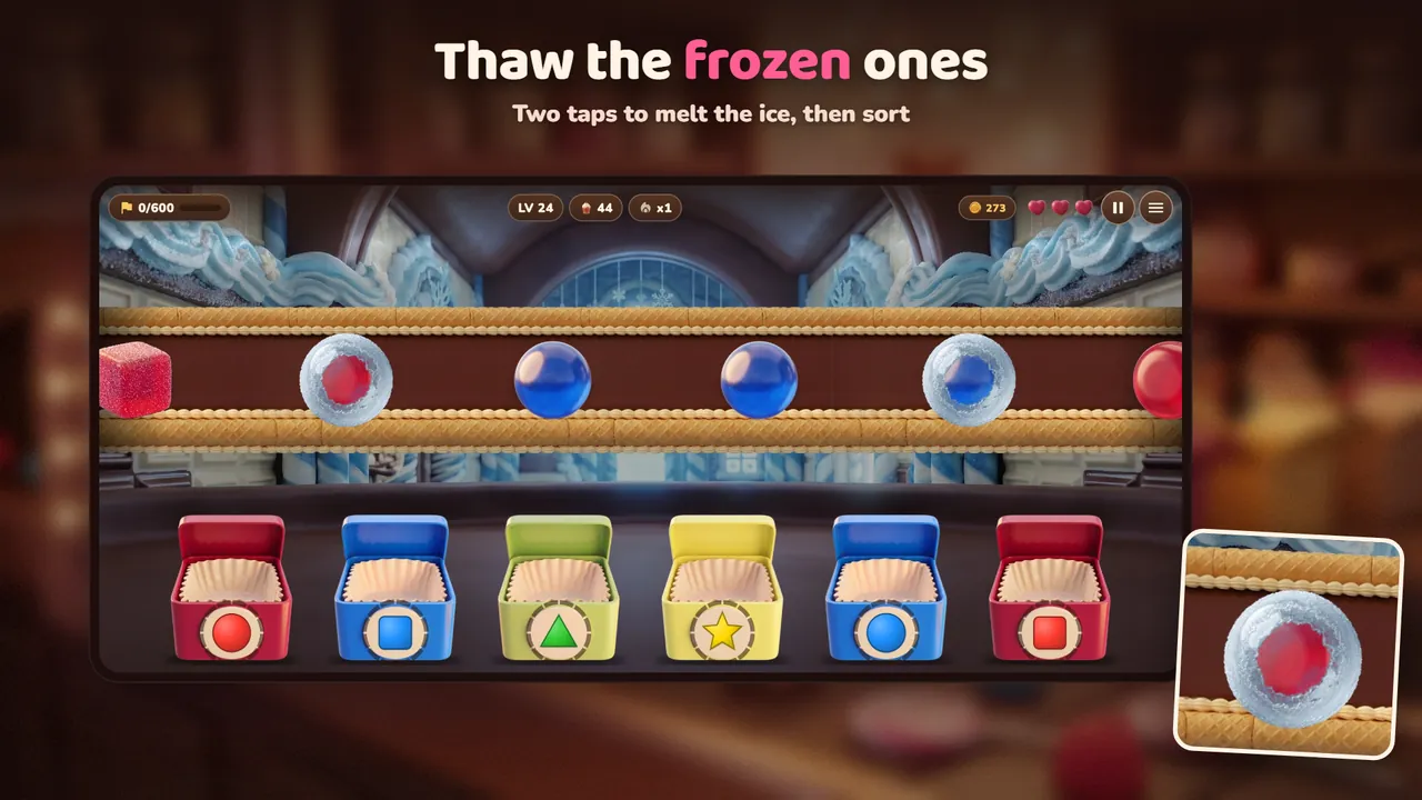 Frozen candies on the belt that must be tapped twice to thaw before sorting