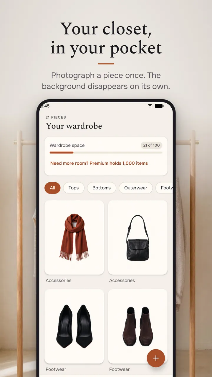 The wardrobe screen with category filters, a wardrobe space bar and photos of a scarf, a bag, heels and boots
