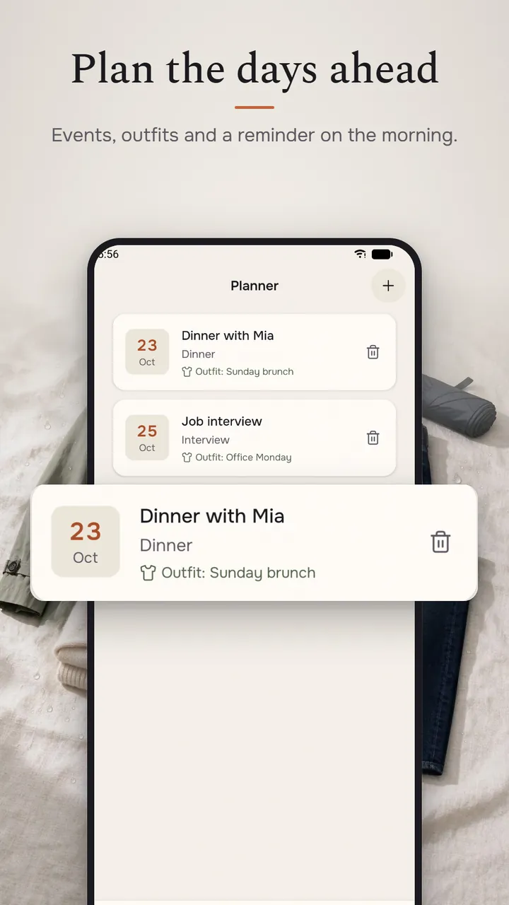 The planner listing a dinner and a job interview in October, each with a saved outfit